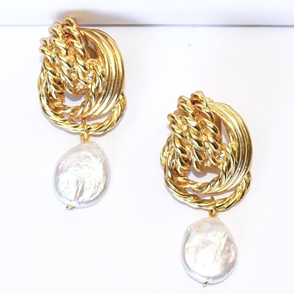 Clip on earrings with flat pearl drop