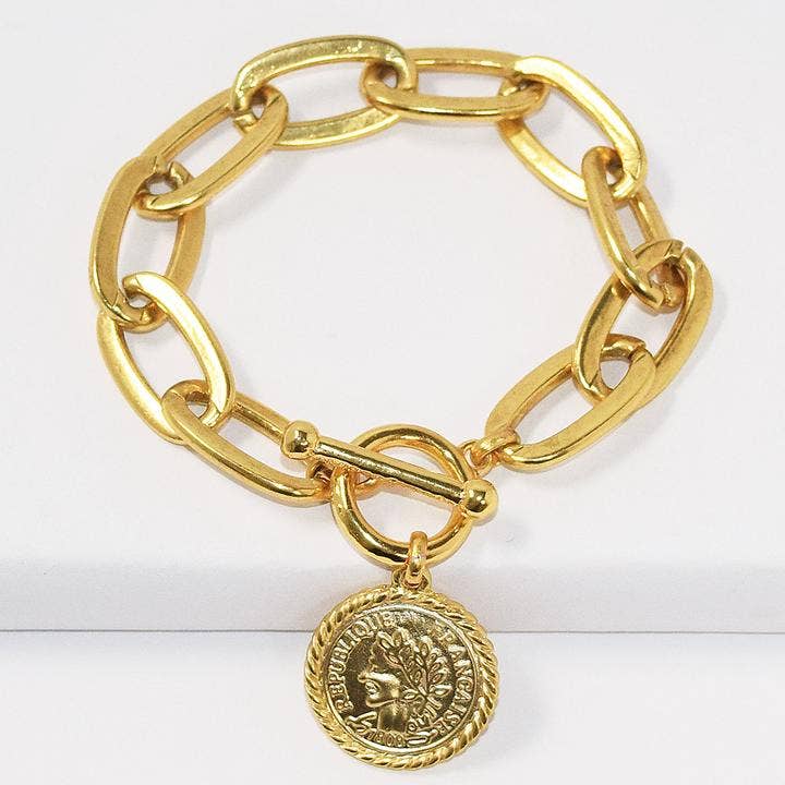 Elongated link layering bracelet with coin charm dangle