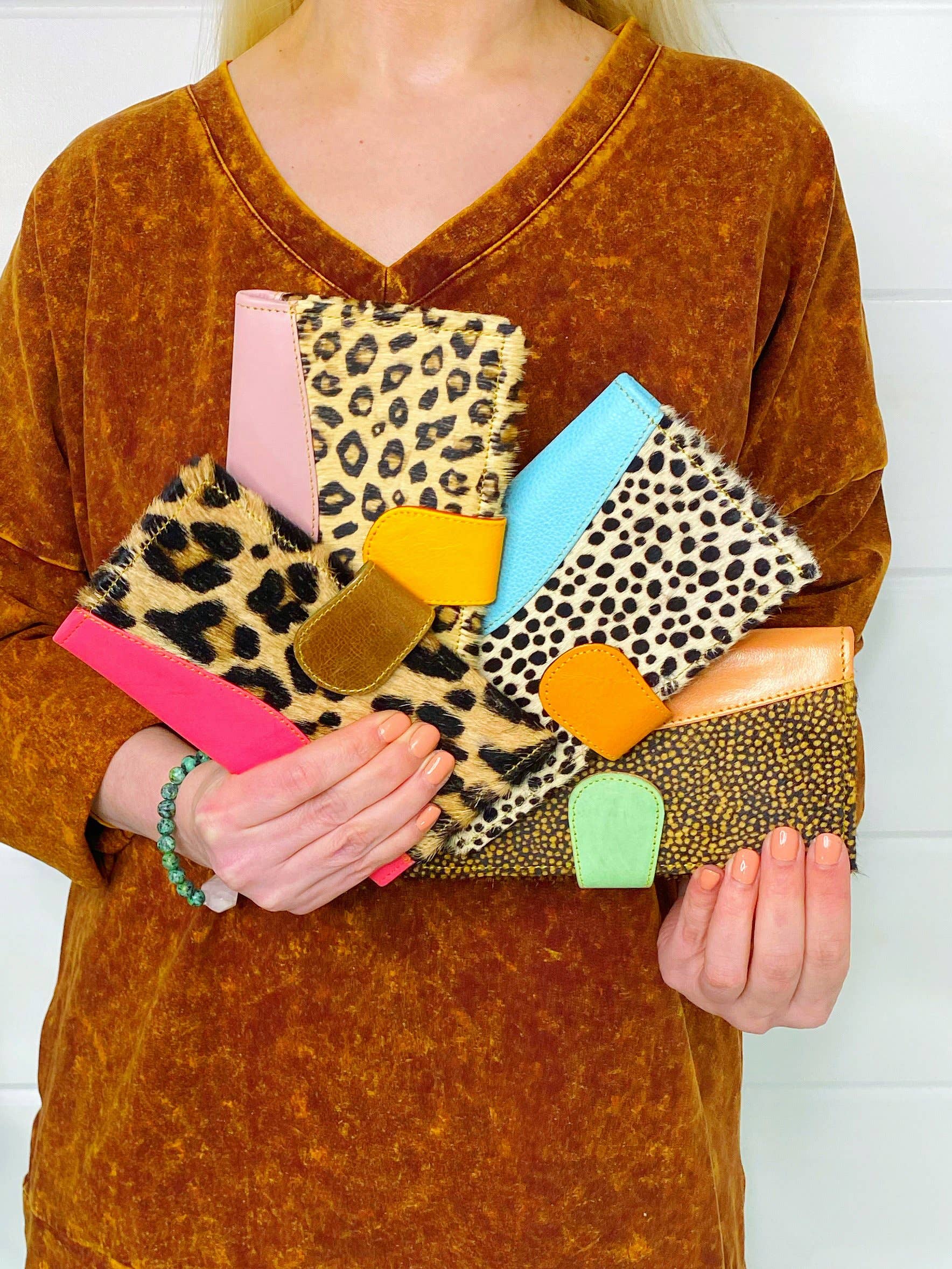 Dotty- sold Real leather clutch. Hair on hide clutch